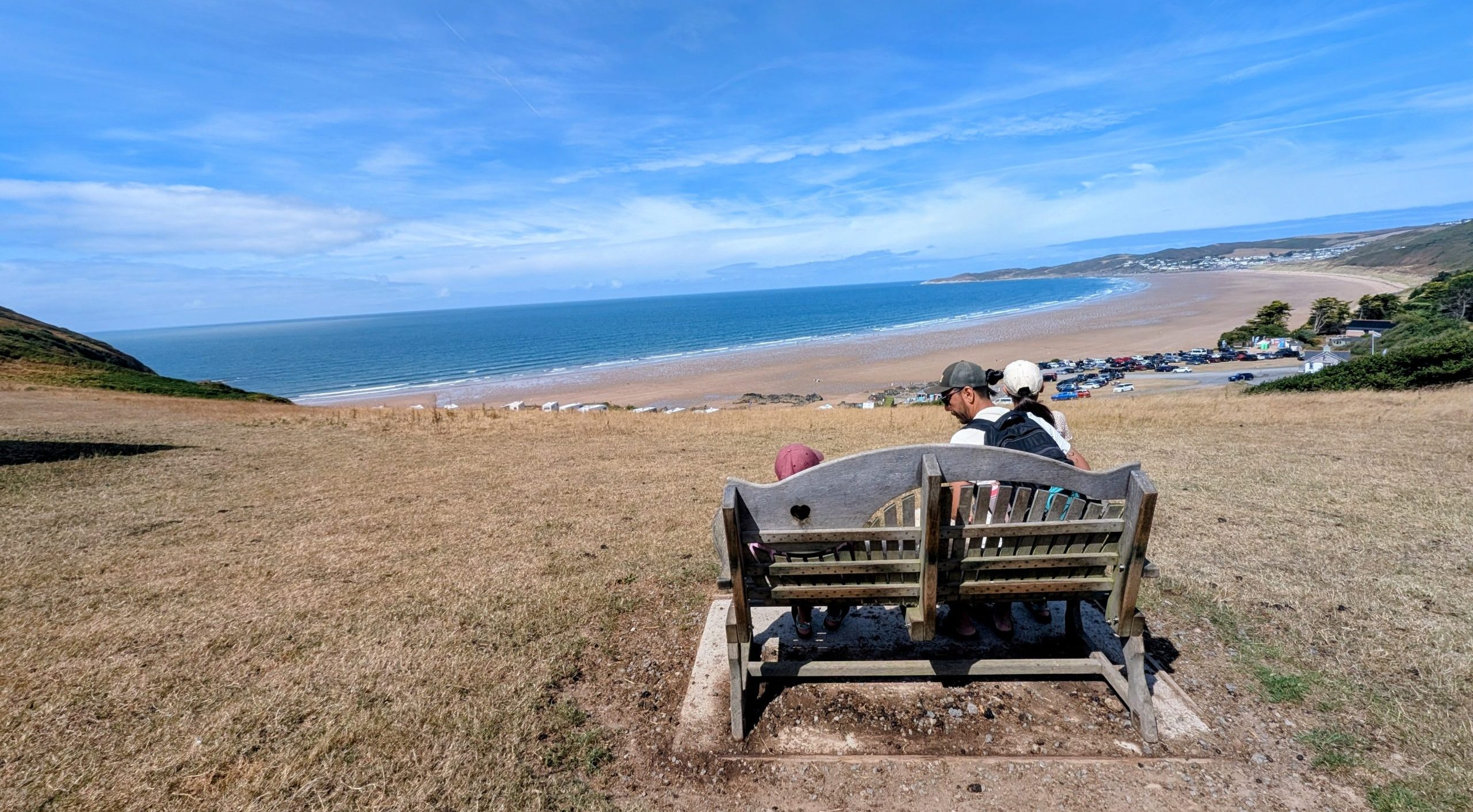 Family looking out to sea, summer 2026